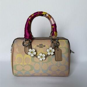 Price is firm NWT Coach Mini Rowan Crossbody Bag Rainbow Signature Canvas CDC39